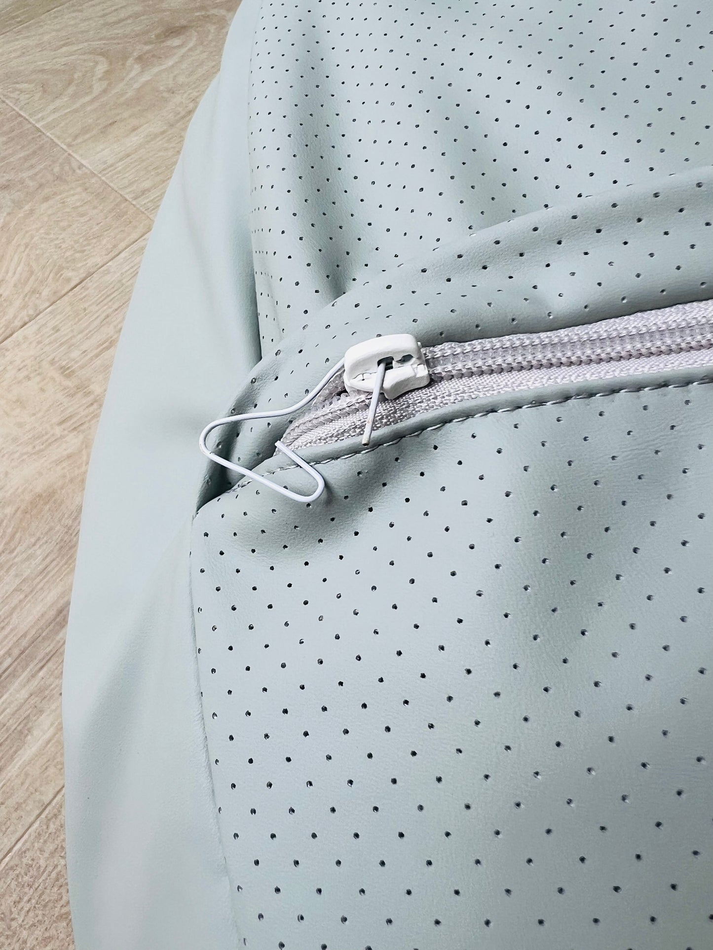 child safety zip, perforated leather, pillow mat, beanbag